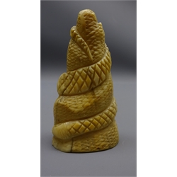  19th century Japanese carved ivory okimono, carved as a snake coiled around a rock, H7cm   
