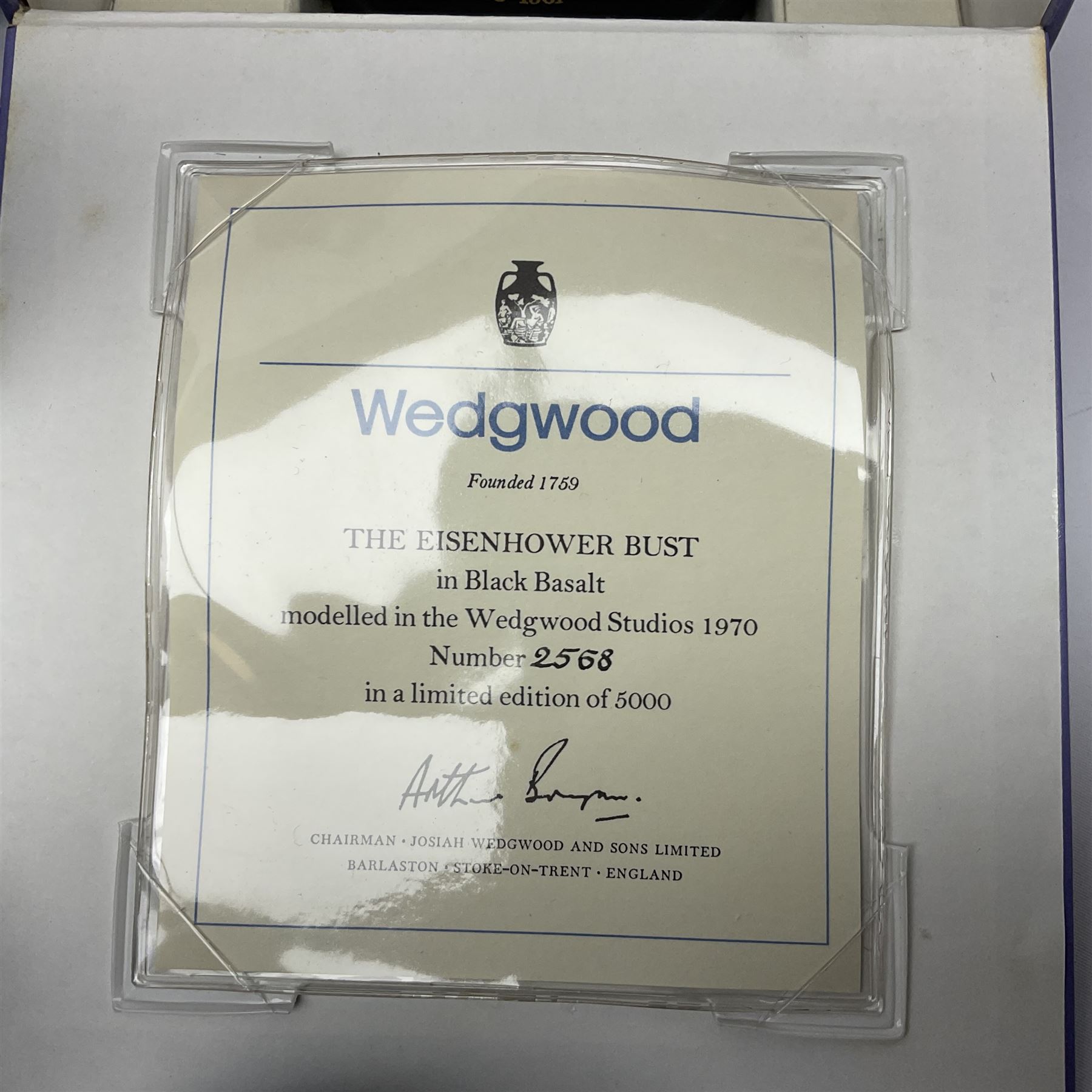 Collection of Wedgwood Jasperware, to include black Eisenhower Bust, two black basalt paperweights, one depicting an eagle and one depicting Julius Caesar, a blue Zodiac plate, Man on the Moon commemorative plate, American Independence Bicentennial plate and Royal commemorative ware, etc, all with impressed marks beneath, some with boxes