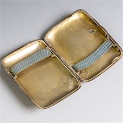 Early 20th century silver coin purse, with floral decoration and finger chain, hallmarked together with an early 20th century cigarette case,  with engraved initials, hallmarked and a silver filigree cigarette case
