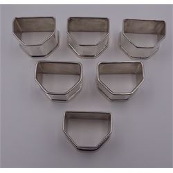 Set of six 20th century Egyptian silver napkin rings, of plain canted form, each marked, approximate total weight 3.49 ozt (108.7 grams)