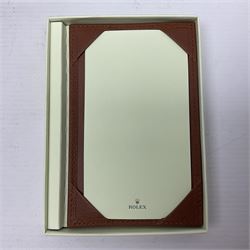 Rolex green leather box, with decorative pleated panel to cover, opening to reveal cream velvet interior, the inside lid stamped Rolex with gilded crown logo, printed mark beneath 'Rolex SA Geneve Swiss 39139.64, together with Rolex note paper in box, box H7.7cm