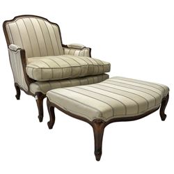 French Louis XV design armchair, shaped back over serpentine fronted seat, raised on cabriole supports (W85cm H90cm); and matching serpentine footstool, both upholstered in cream striped fabric (W82cm D55cm H30cm)
