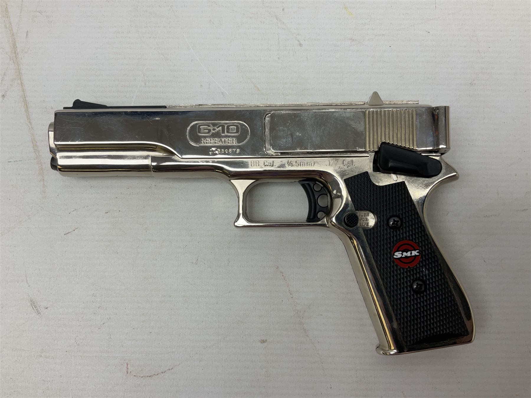 G-10 .177 20-shot BB Repeater air pistol with deluxe nickel plated finish; boxed with instructions