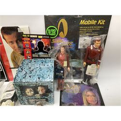 Quantity of Star Trek memorabilia and promotional merchandise including action figures, calendars, mobile kit, collector's fact cards, models etc; many in original packaging