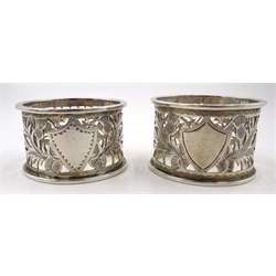  Two Edwardian silver napkin rings, pierced thistle design by George Nathan & Ridley Hayes Chester 1902/5, cased and four others hallmarked, approx 4.2oz   