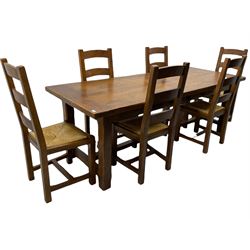 Antix French oak dining table with two leaves, two frieze drawers;, and six ladder back chairs with rush seats