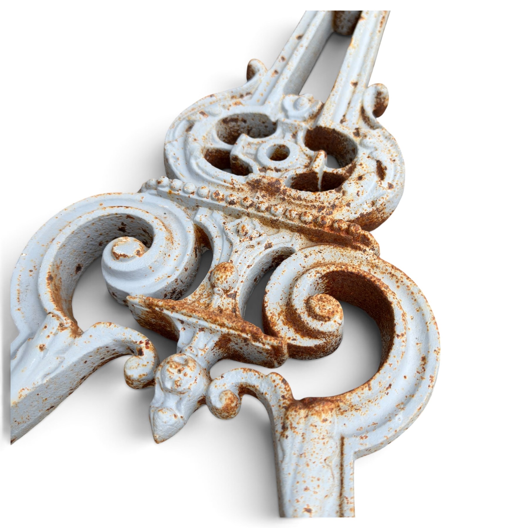 Assorted garden and architectural salvage, comprising a galvanised watering can, two long-handled cutting tools, metal pole, pair of ornate cast iron supports and further decorative fragments