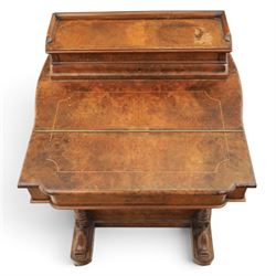 Victorian burr walnut Davenport, with hinged stationary top and slope, pull out writing surface with tooled green leather inset top, carved and turned front supports, flanked by two cupboard doors, raised on castors 