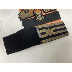 Quantity of WW1 and later Royal Navy and RAF cloth and metal badges and insignia