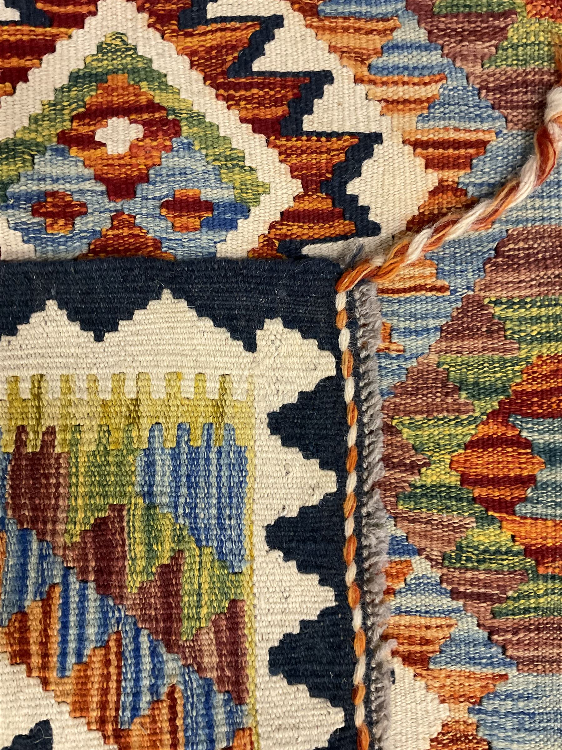 Chobi Kilim runner, geometric design decorated with six lozenges, multi-coloured ground