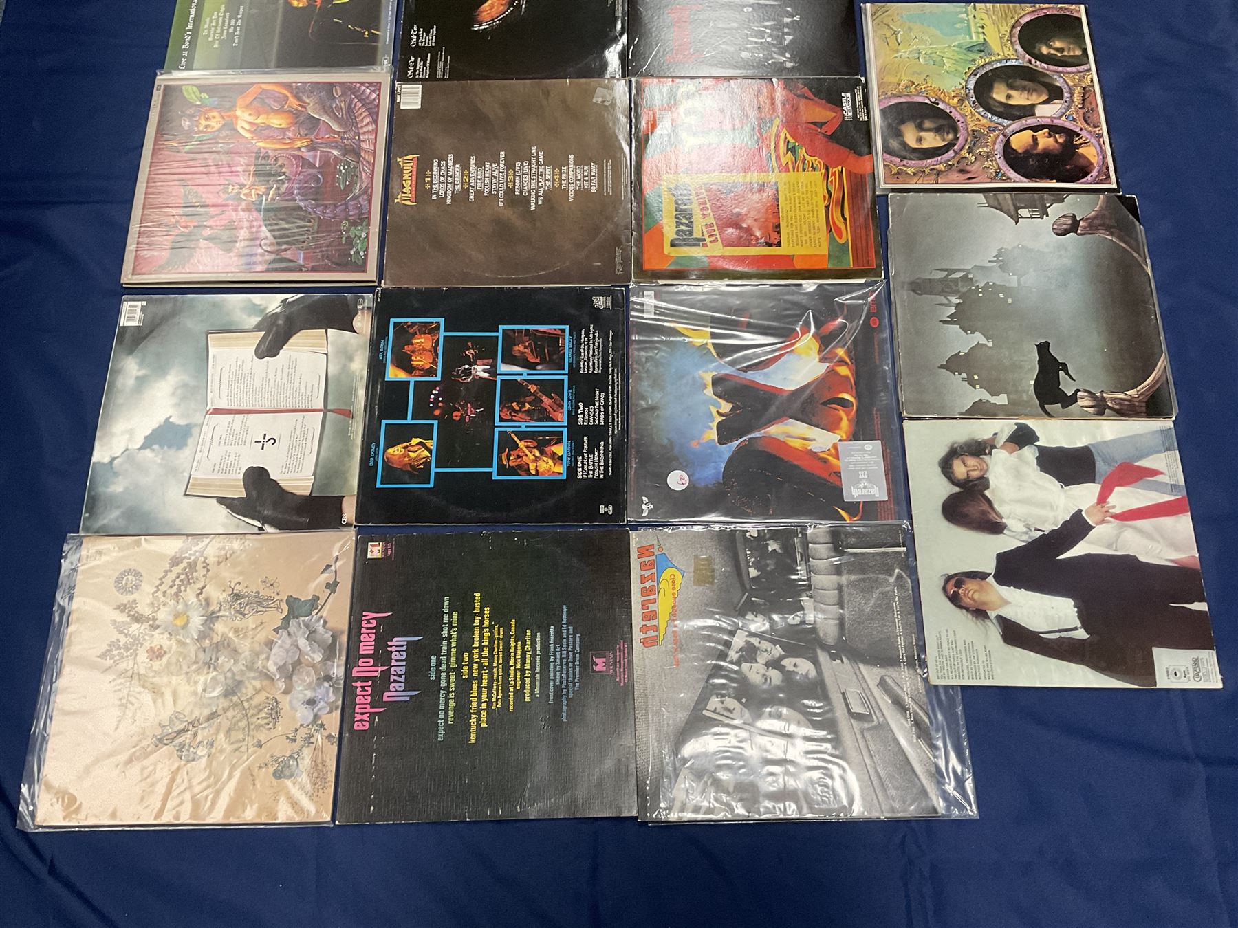 Rock, hard rock and progressive rock vinyl LPs including Greenslade 'Bedside manners are extra', 'Time and Tide', Nazareth 'No mean city', 'Close enough for Rock 'n' Roll', 'tattooed on my brain', 'Rampant', 'expect no mercy', Magnum 'Marauder', 'Anthology', 'Kingdom of Madness', 'Lost On The Road To Eternity' etc (19)