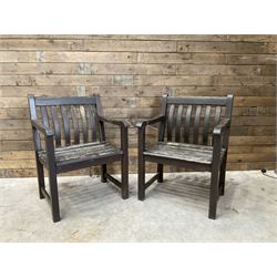 Pair of small stained hardwood garden benches