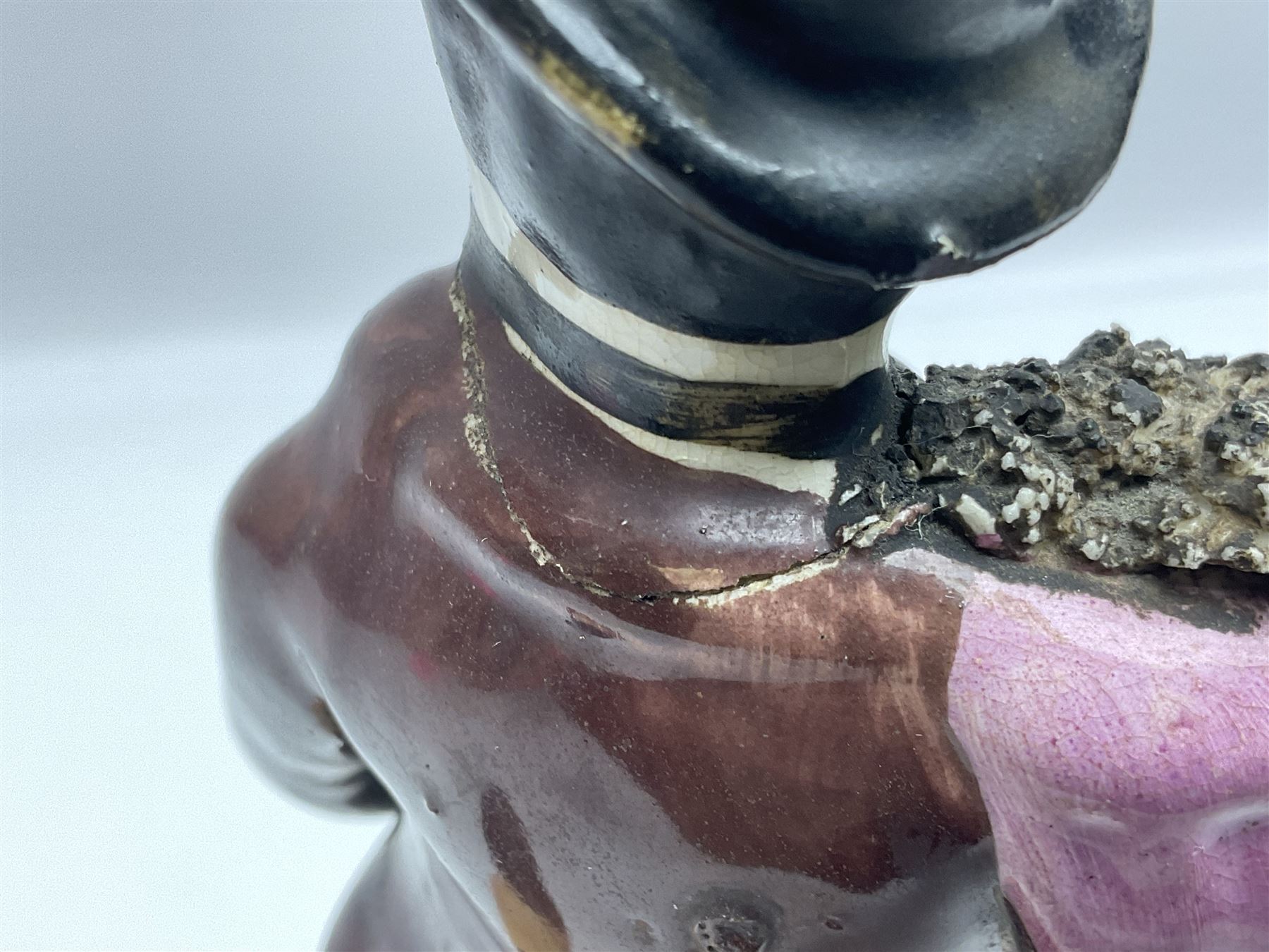 19th century Staffordshire figure of Robert Peel, titled 'Sir Robert Peel', modelled on horseback, atop an oval plinth base featuring a naturalistic and floral design, H30cm 