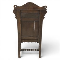 17th century style carved oak Wainscott chair, intricately carved back, united by a turned stretcher