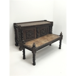  Victorian heavily carved two tier oak buffet, removable top tier on barley twist supports, the lower section fitted with panelled double cupboard,  W127cm, H135cm, D49cm  