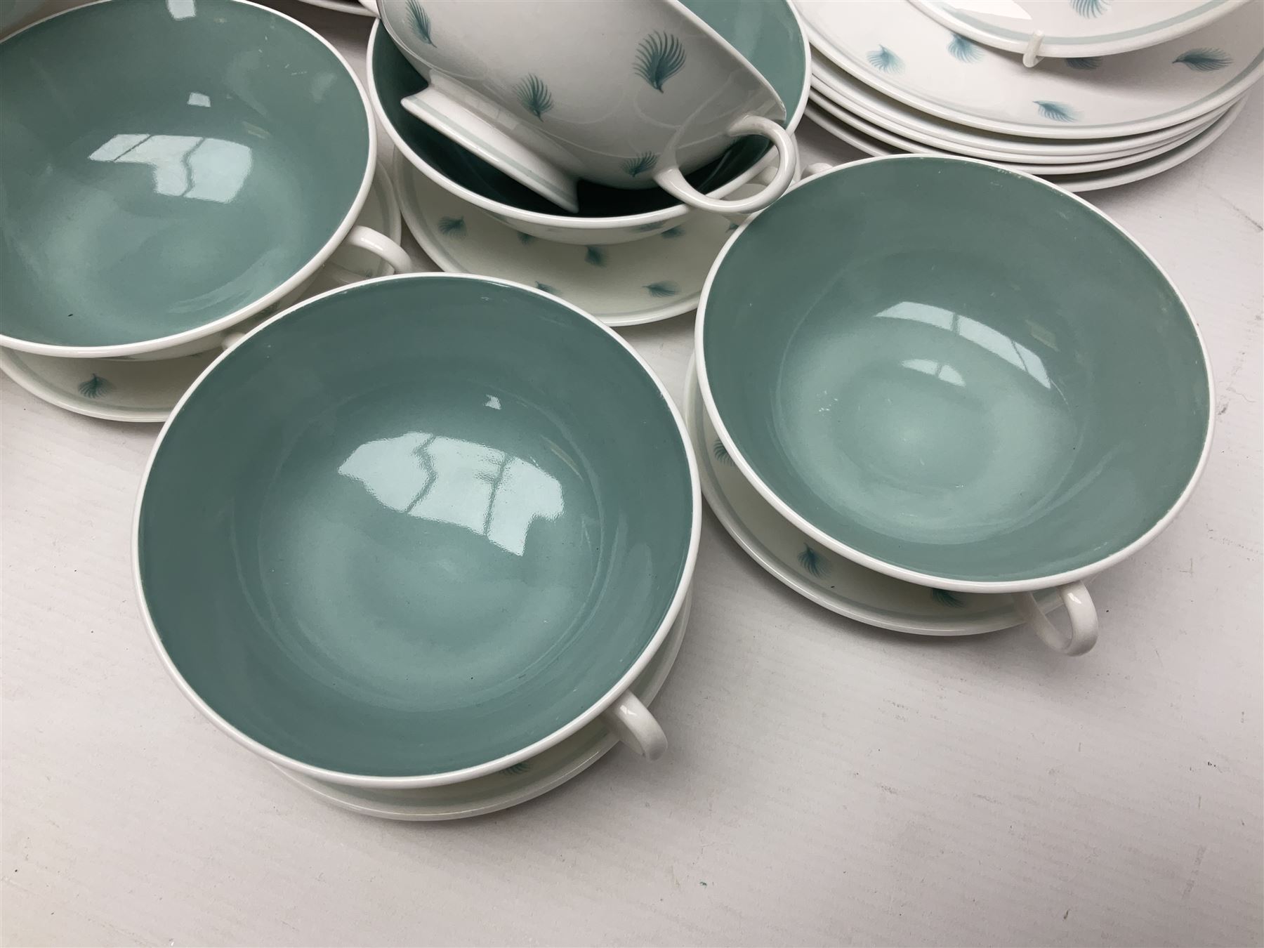 Susie Cooper Whispering Grass pattern dinner wares, to include tureen with cover, six twin handled soup bowls, dinner plates and side plates, etc 