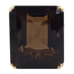 Large gold rectangular smoky quartz ring, with foliate design gallery and scroll shoulders