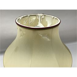 Moorcroft table lamp of squat baluster form, decorated in the Autumn Blackberry, with Moorcroft cream fabric shade with gold, green and red piping, overall H38cm