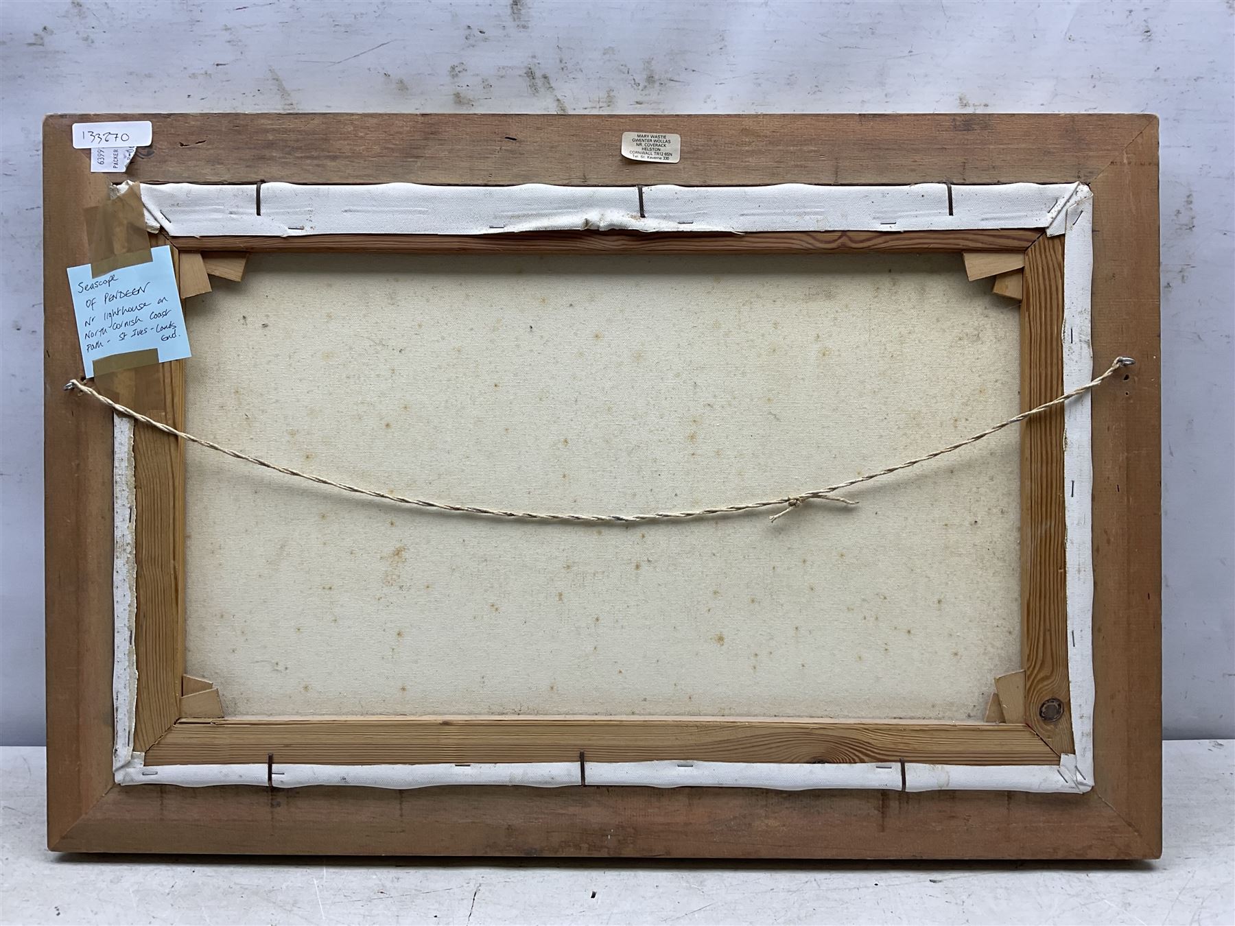 Mary Wastie (Cornish 1935-): Rocky Seascape near Pendeen, oil on canvas signed 39cm x 65cm 