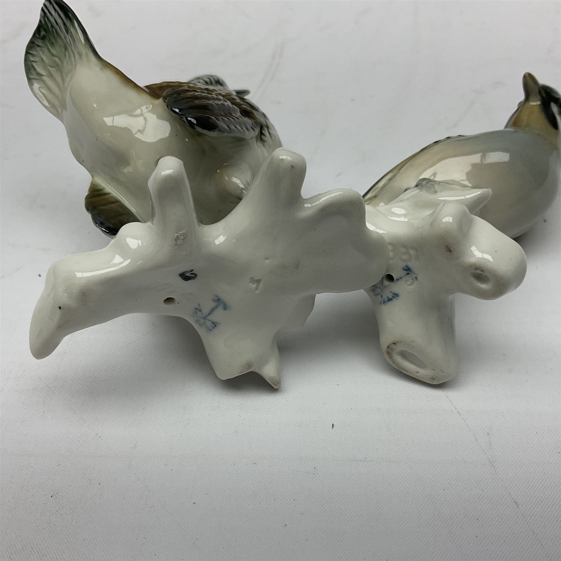 Eight Karl Ens bird figures, together with Mack blue tit and one other