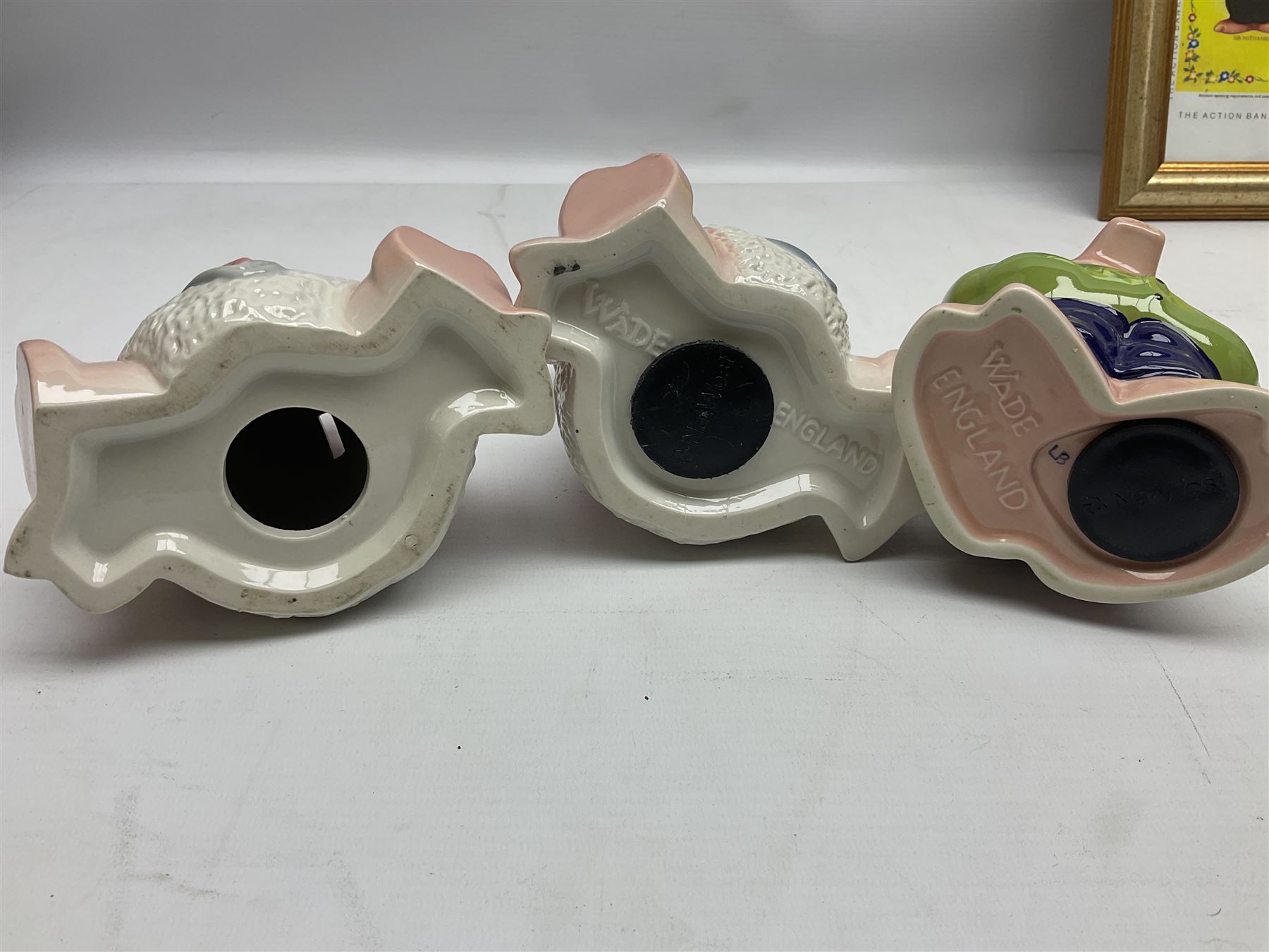  Full Set of Wade Natwest Pigs to include cousin Wesley, with an additional baby and framed leaflet 