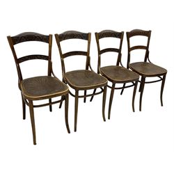 Jacob & Josef Kohn - set of four early 20th century Austrian bentwood chairs, each with carved decoration to the shaped backrest and shaped seat, on splayed supports with stretchers, marked with the manufacturer's stamp and paper label beneath