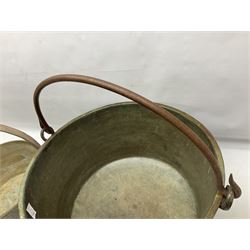 Two brass jam pans with cast iron handles, largest D49cm