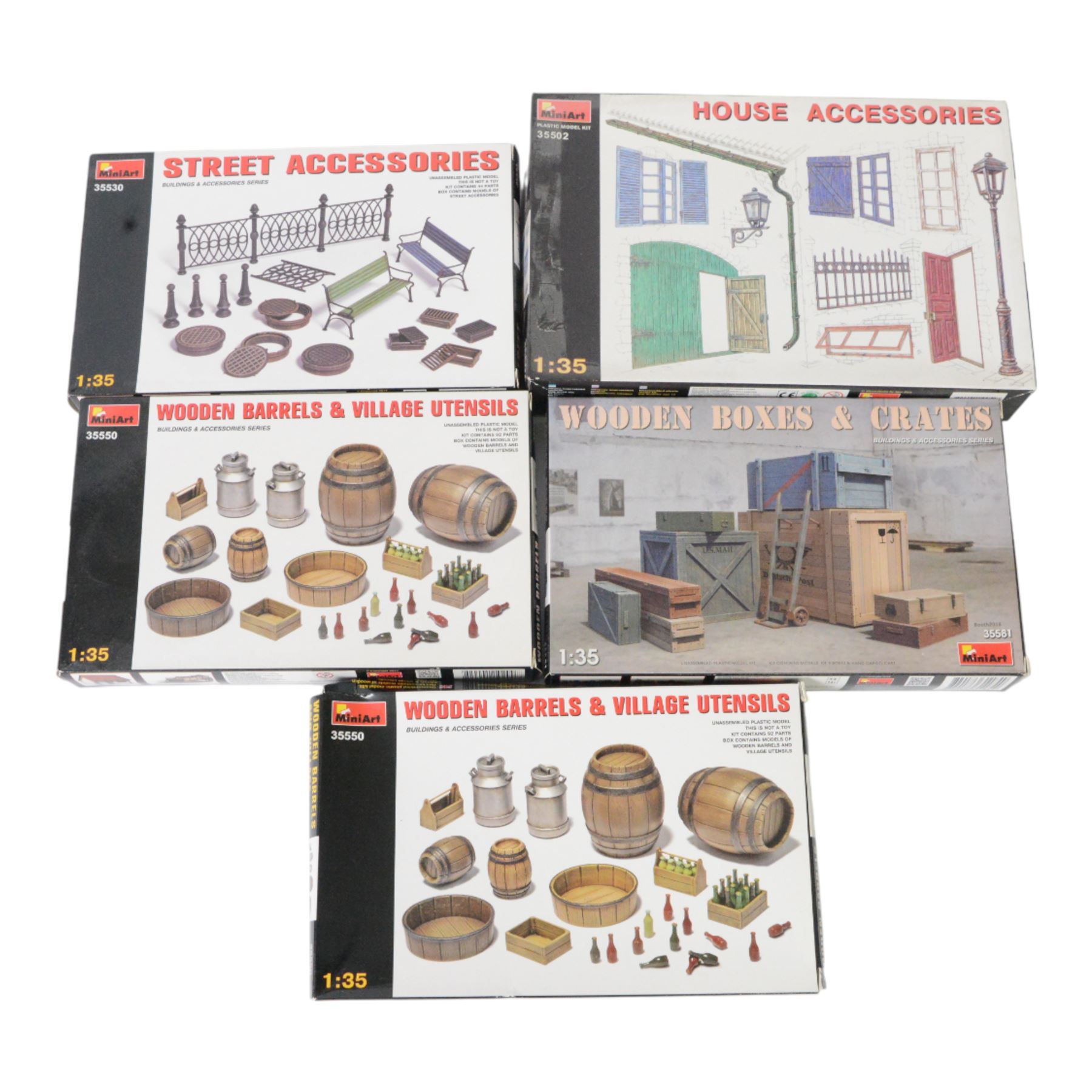Seventeen Mini Art 1:35 scale model building and accessory kits, comprising 36017 European Farmyard, 35511 Ruined Garage, 35508 Italian City Building, 35536 Ruined Building, 35507 French Farmyard, 36020 Village Road with Ruined House, 36034 Farm Gate with Base, 35537 German Pharmacy Ruin, 35502 House Accessories, 35005 Building Accessories, 35583 Cable Spools, 35571 Wine Bottles and Crates, 35530 Street Accessories, 35578 Water Pump, 35581 Wooden Boxes and Crates and two 35550 Wooden Barrels and Village Utensils, all boxed
