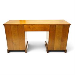 Royal Oak Furniture Company Of Grassington - Georgian design oak kneehole desk, rectangular top with moulded edge, fitted with central frieze drawer flanked by eight graduating drawers, raised on skirted base