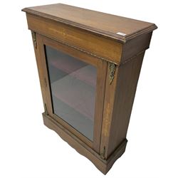 Victorian walnut pier cabinet, moulded rectangular top over inlaid frieze, decorated with gilt metal mounts and beading, the glazed single door flanked by inlaid uprights, on moulded plinth base