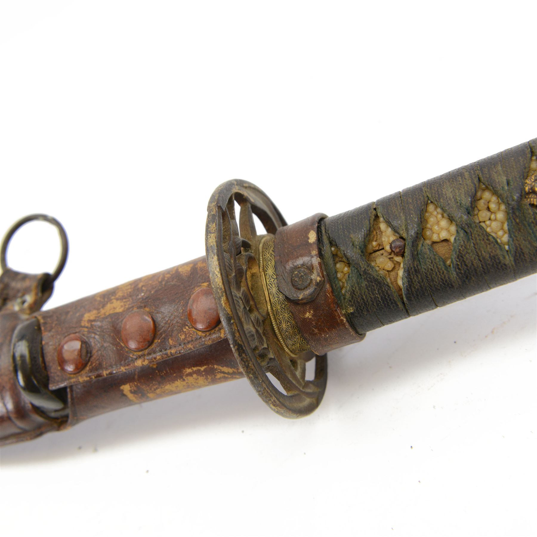 Japanese Army Officers Gunto Sword,  with 64cm steel single edged blade, bronze tsuba and wrapped fish skin grip, in leather scabbard overall L87cm