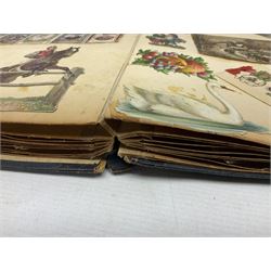 Victorian scrapbook of various fixed decoupage to include, greeting cards, portraiture, flowers, animals etc,