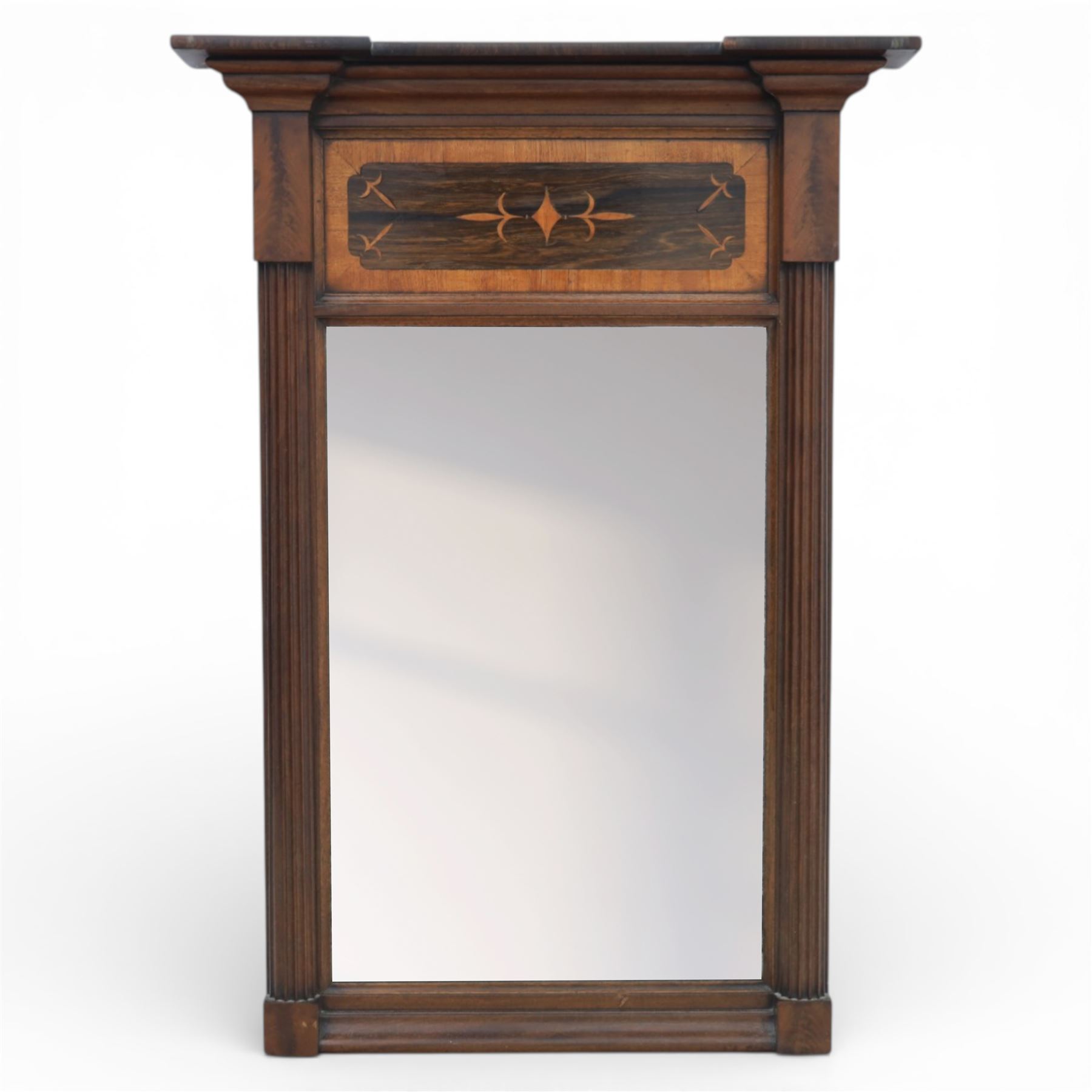 Early 19th century Regency mahogany pier glass, the original rectangular mirror plate within fluted pilaster uprights, with satinwood and rosewood crossbanded and inlaid frieze above