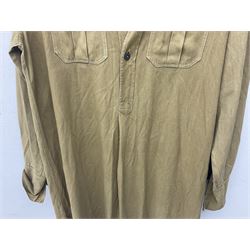 1930s Hitler Youth brown shirt, long length with two pockets, bears triangular badge 'Nord Nordsee'