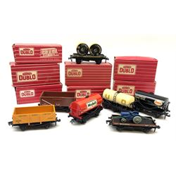 Hornby Dublo - 4646 Low-Sided Wagon D1 with cable drums; 4649 Low-Sided Wagon with tractor; 4656 16-Ton Mineral Wagon brown in Tony Cooper 1984 box; 4657 United Dairies Milk Tank Wagon; 4660 U.G.B. Sand Wagon; 4677 Tank Wagon 'Mobil' (D1); and 4680 Tank Wagon 'Esso' (Fuel Oil); all boxed (7)