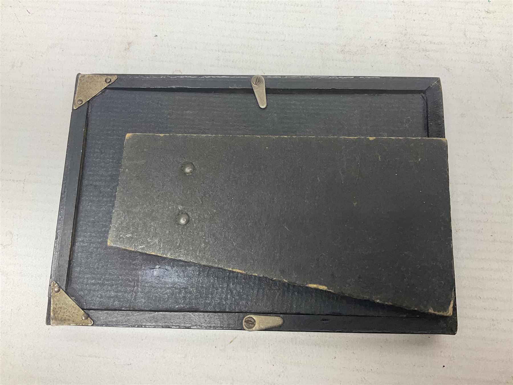 WWII group of three medals comprising 1939-45 War Medal and Italy and Africa Stars in issue box; dog tags for 282894 W. Wilkinson with framed photograph in uniform; and small quantity of cloth and metal badges including RAOC cap badge