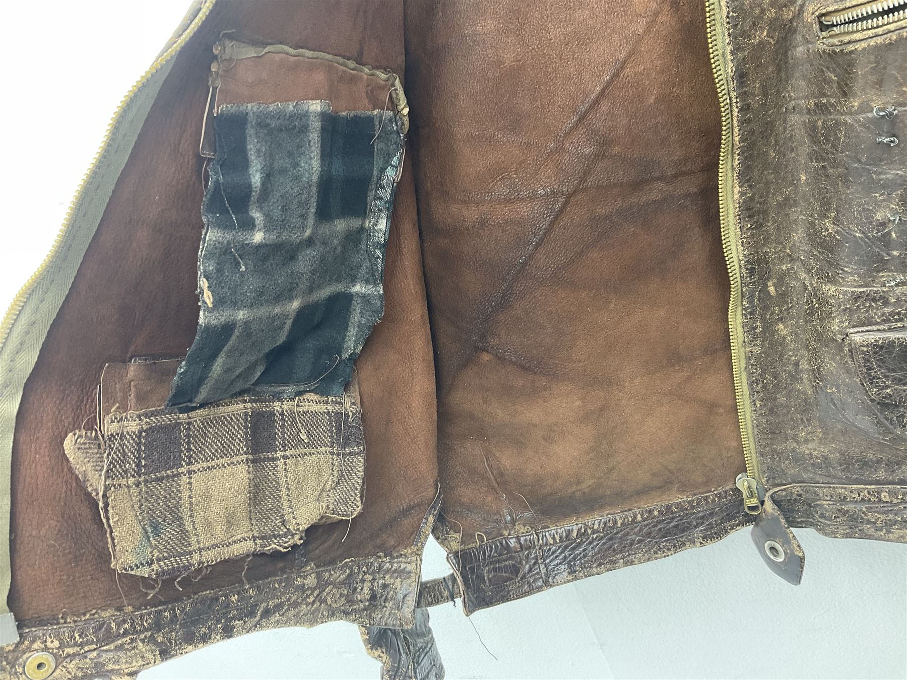 German Luftwaffe Hartmann leather jacket with tartan pocket linings, pocket zip pulls marked 'Eclair Bte.S.G.D.G.'