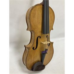 Copy of a full size Stradivarius violin, with an ebonised fretboard, tailpiece and tuning pegs, with a polished chin rest  Length 60cm