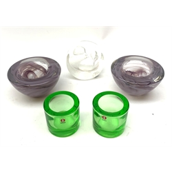 A collection of art glass, comprising a pair of lilac Kosta Boda Atoll bowls designed by Anna Ehrner, D11.5cm, a pair of Littala Kivi Marimekko lime bowls designed by Heikki Orvola, D6.5cm, and a Mats Jonasson glass paperweight depicting two duclings, H9.5cm. 