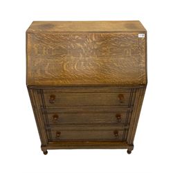 Mid 20th century oak fall front bureau, fitted with three drawers
