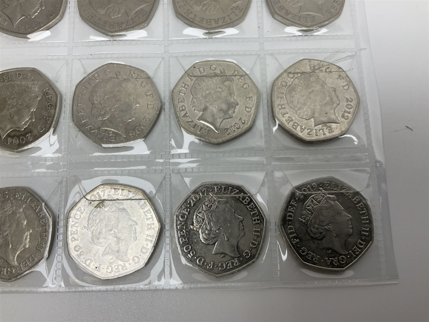 Queen Elizabeth II decimal fifty pence coins, including commemoratives, face value 11 GBP