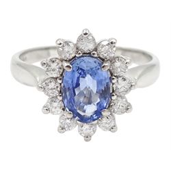 18ct white gold oval sapphire and round brilliant cut diamond cluster ring, Birmingham 2004