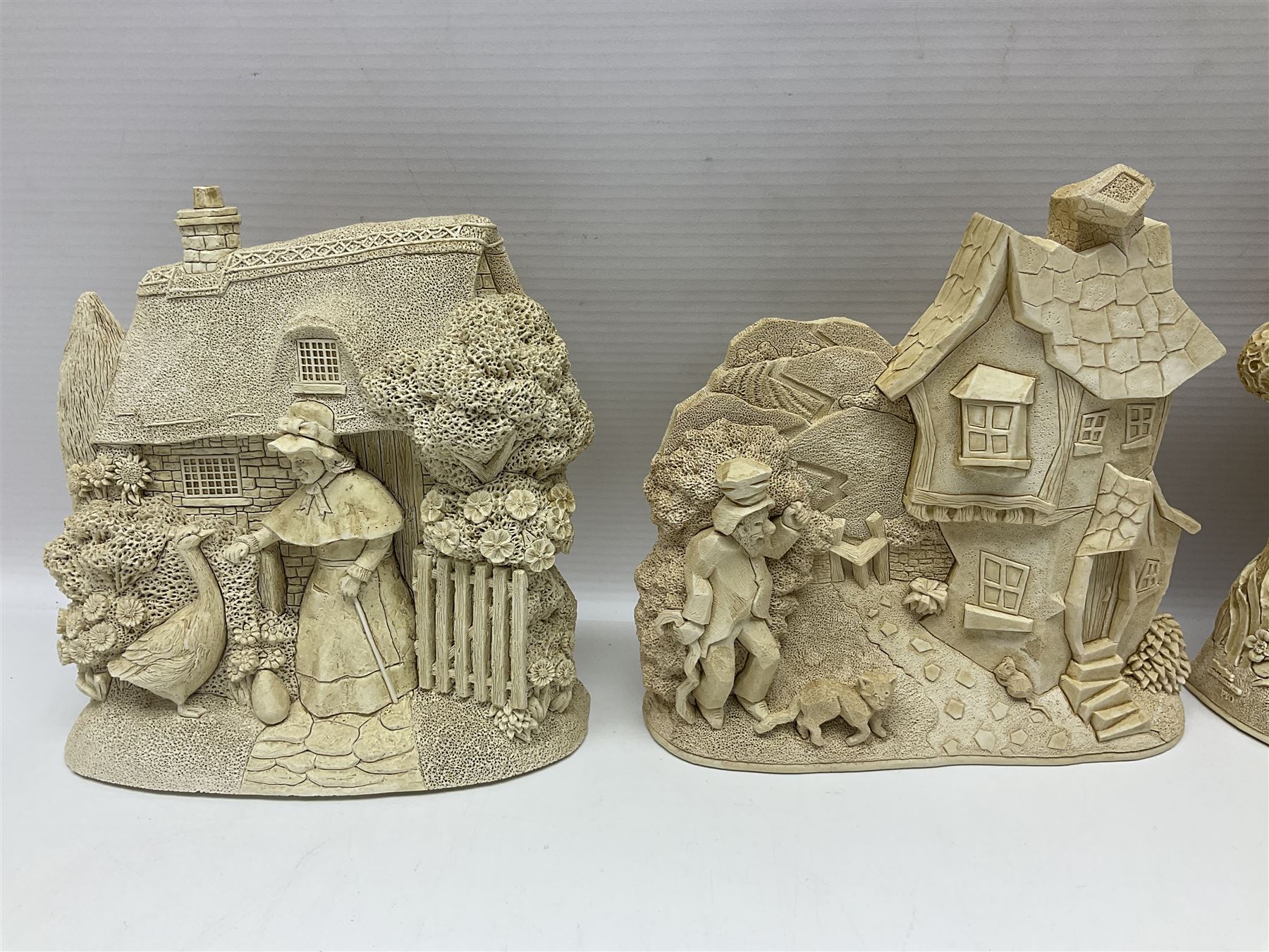 Thirty three Lilliput Lane models from the British collection and paint your own Children's Plaques, to include I am a little teapot, Gnome improvements, Dennis the Dragon, Bill and Ben, The Bobbins etc, some with boxes and deeds 