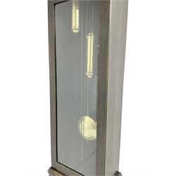 20th century Art Deco- oak cased 8-day longcase clock c1930, flat topped case with a fully glazed door on a stepped plinth, silvered circular dial with Arabic numerals and pierced steel hands, chain driven twin train movement with  4 gong rods. With pendulum and two brass cased weights.