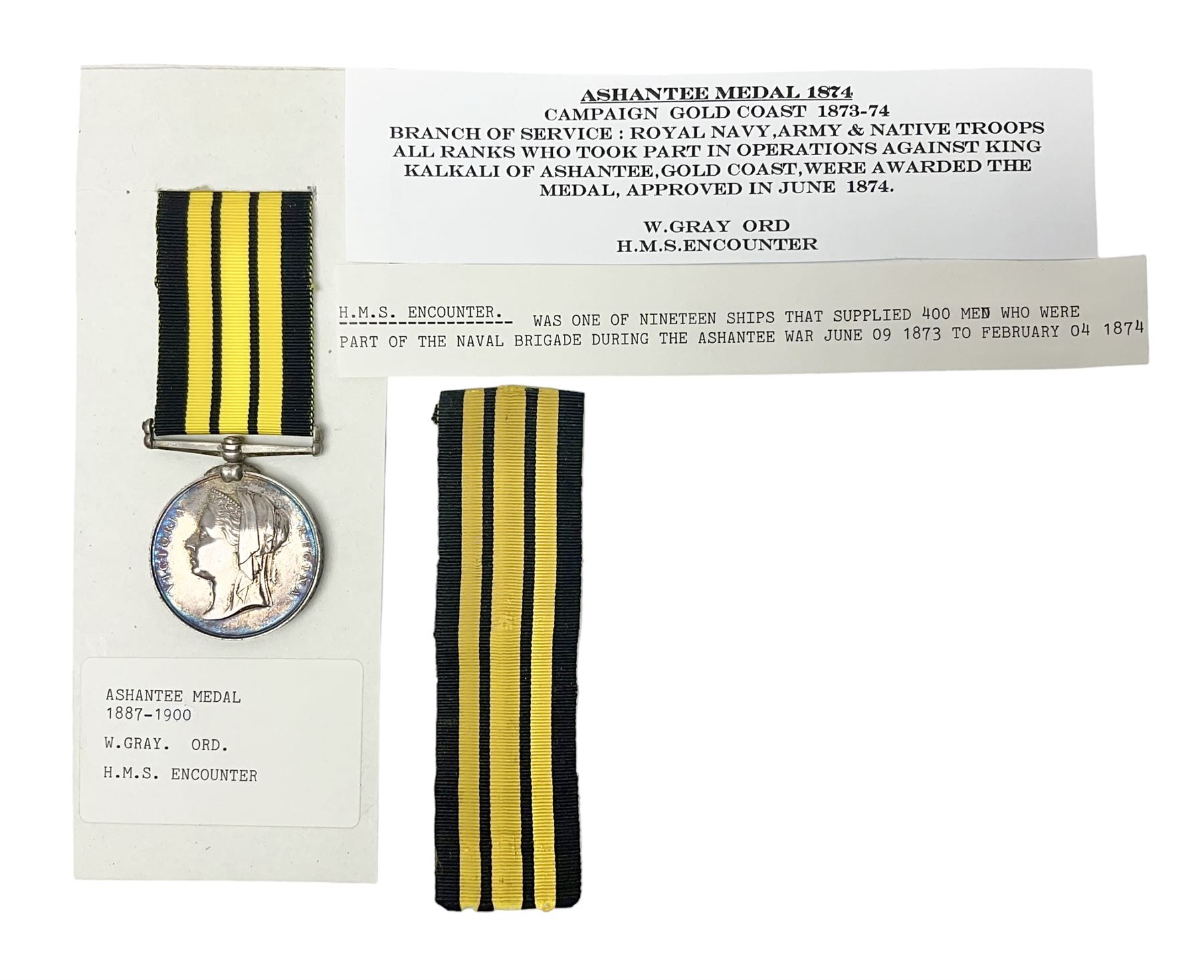 Victoria Ashantee Medal 1887-1900 awarded to W. Gray Ord. H.M.S. Encounter 73-74; with replacement ribbon but original present.