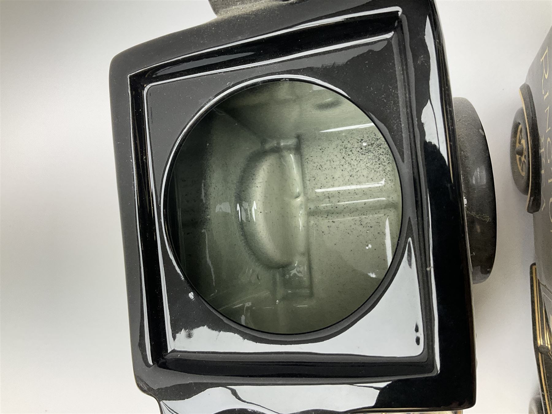 Three Ringtons novelty teapots, comprising The Ringtons Van teapot, the Tea Merchant teapot, and Millenium Celebration teapot. 