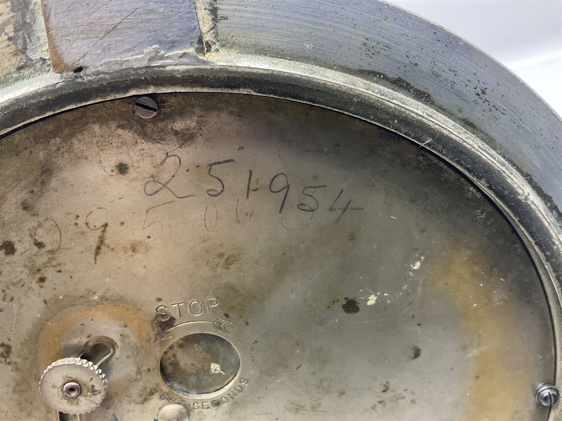 WWII period US Navy Mark I deck clock, the black circular dial with Arabic numerals,  luminous dot markers and subsidiary seconds dial marked 'Mark I Deck Clock U.S. Navy 15211 1941', in bronze bulk head case D20cm; and a Loose-Wiles Biscuit Company octagonal tin decorated with nine different US Warships (2)