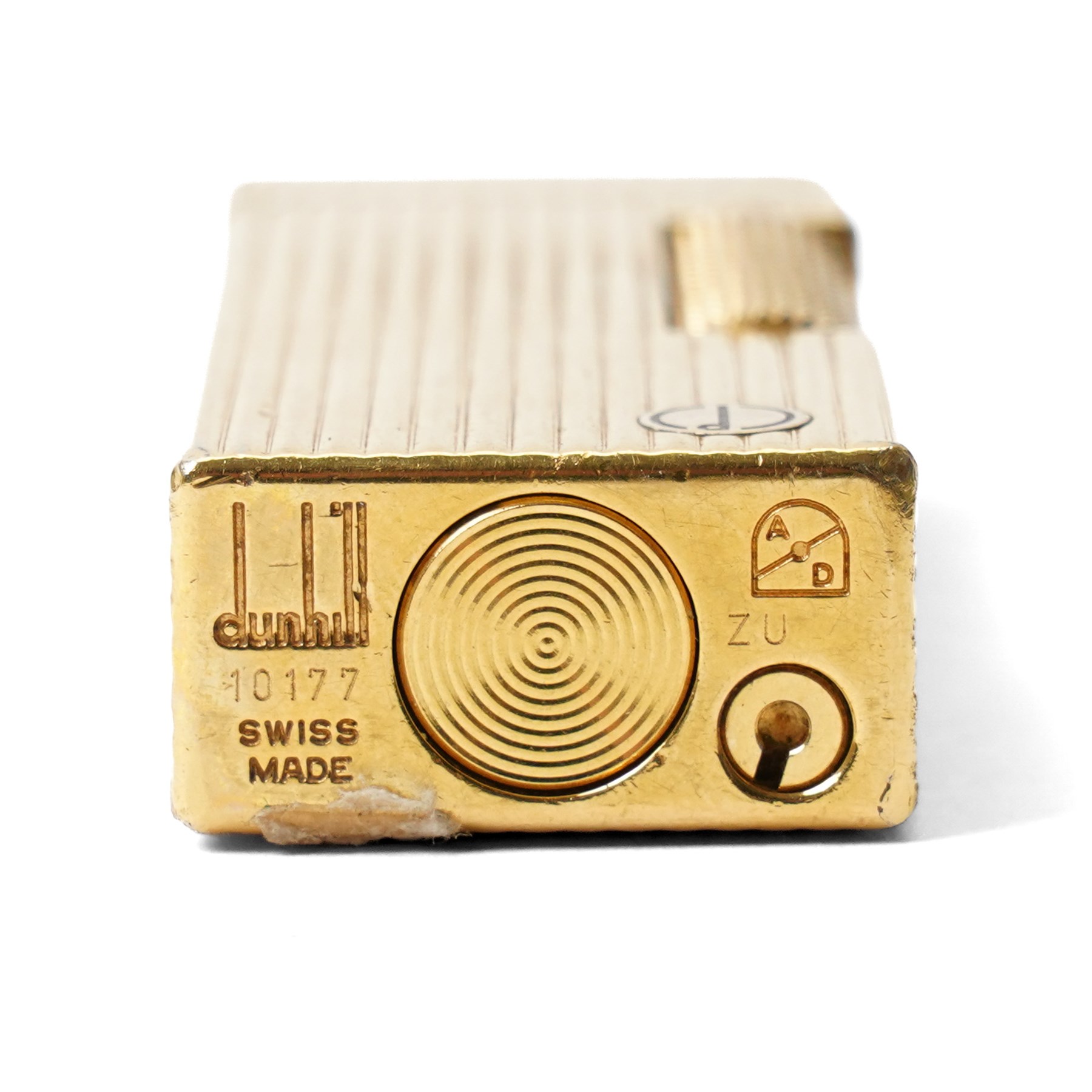 Dunhill - Rollagas lighter, gilt metal with vertical reeded decoration and ribbed thumbpiece, H6.5cm 