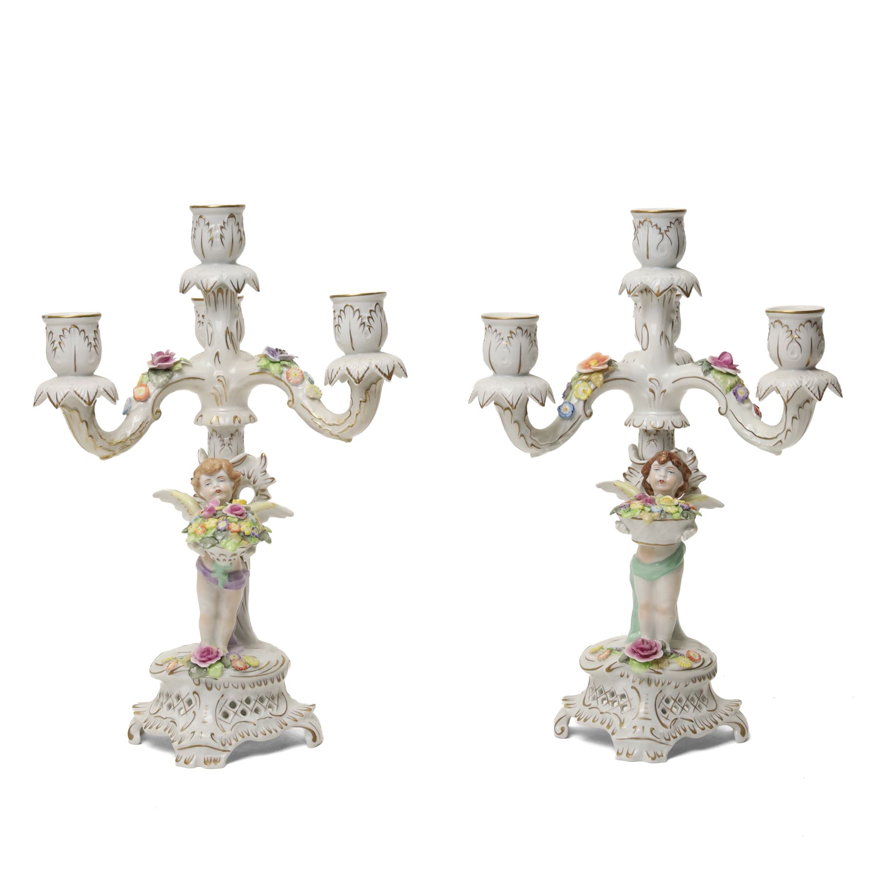 Pair of German porcelain three branch candelabra, the based modelled with putti holding flowers, printed blue mark to base, H35cm (2)