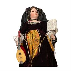 Alberon doll in tudor dress, together with another dressed as Robert Devereux Early of Essex and a Dolmetsch Treble recorder